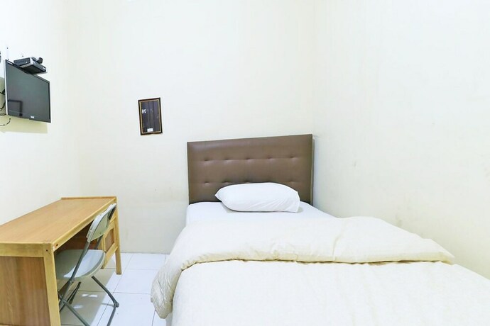 Imagen de la habitación del Hotel SPOT ON 92037 Jokotole 2 Homestay. Foto 17