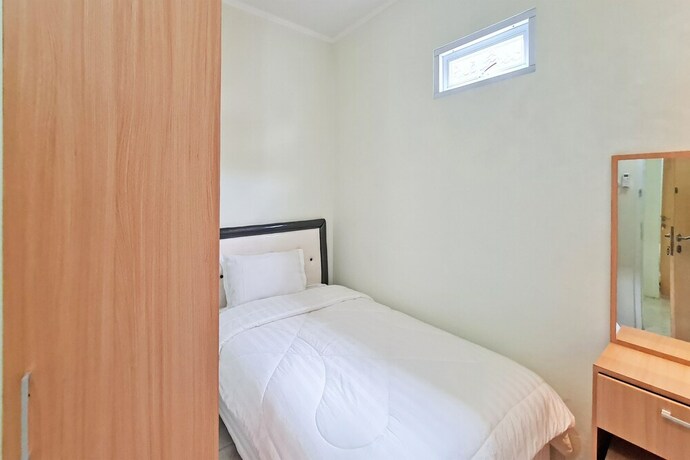 Imagen de la habitación del Hotel SPOT ON 92037 Jokotole 2 Homestay. Foto 18