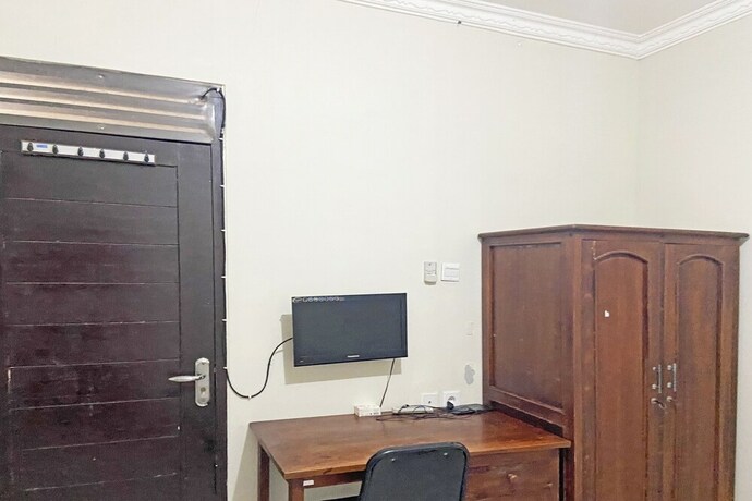 Imagen de la habitación del Hotel SPOT ON 92037 Jokotole 2 Homestay. Foto 20