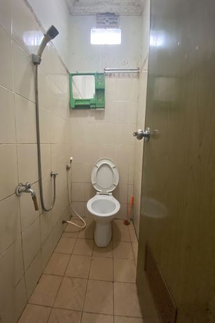 Imagen de la habitación del Hotel SPOT ON 92042 Sumber Rejo Homestay. Foto 6