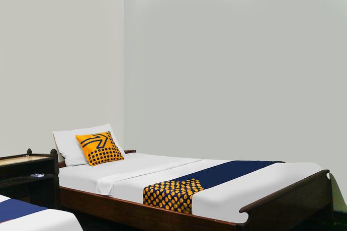 Imagen de la habitación del Hotel SPOT ON 92063 Balebat Endah Syariah. Foto 4