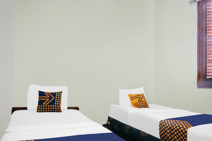 Imagen de la habitación del Hotel SPOT ON 92063 Balebat Endah Syariah. Foto 5