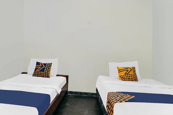 Imagen de la habitación del Hotel SPOT ON 92063 Balebat Endah Syariah. Foto 6