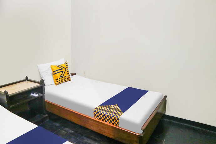 Imagen de la habitación del Hotel SPOT ON 92063 Balebat Endah Syariah. Foto 11