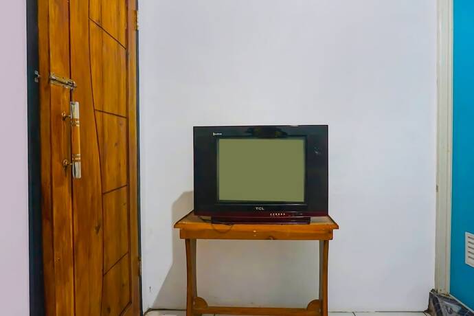 Imagen de la habitación del Hotel SPOT ON 92154 Nusasari Guest House. Foto 19