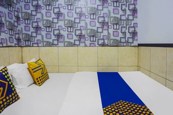 Imagen de la habitación del Hotel SPOT ON 92154 Nusasari Guest House. Foto 20