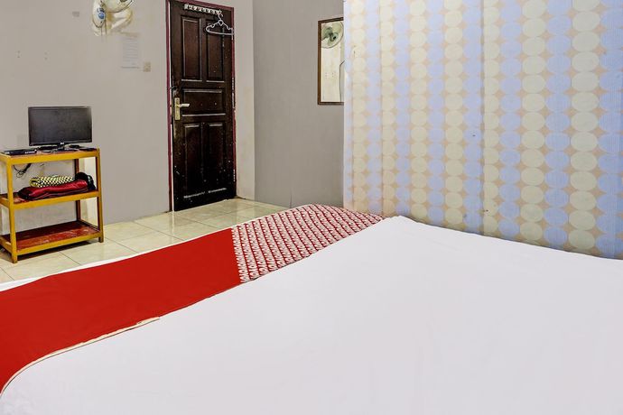 Imagen de la habitación del Hotel SPOT ON 92208 Andira Syariah. Foto 1