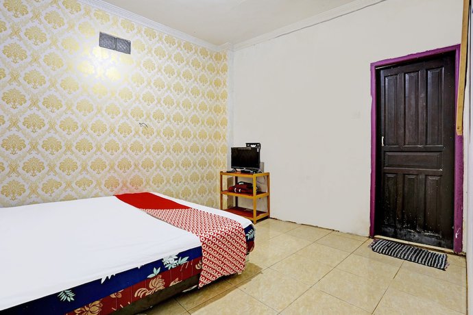 Imagen de la habitación del Hotel SPOT ON 92208 Andira Syariah. Foto 2