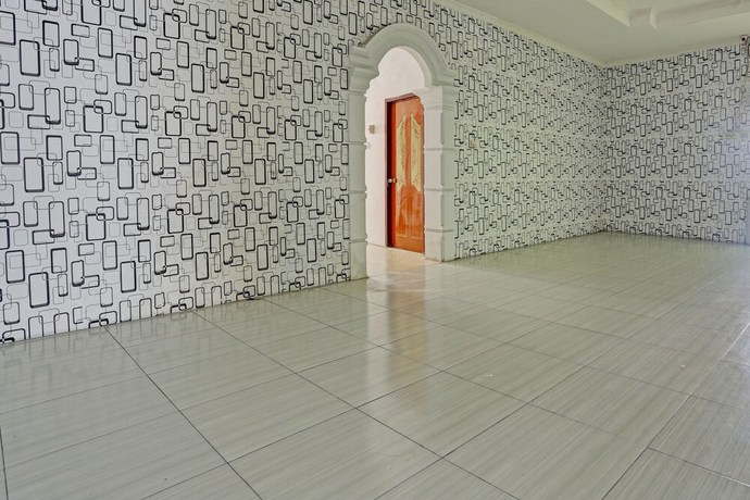 Imagen de los interiores del Hotel SPOT ON 92208 Andira Syariah. Foto 14