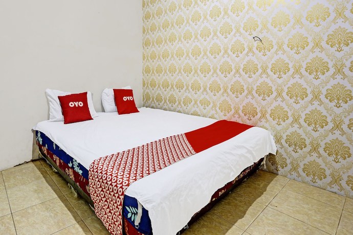 Imagen de la habitación del Hotel SPOT ON 92208 Andira Syariah. Foto 5