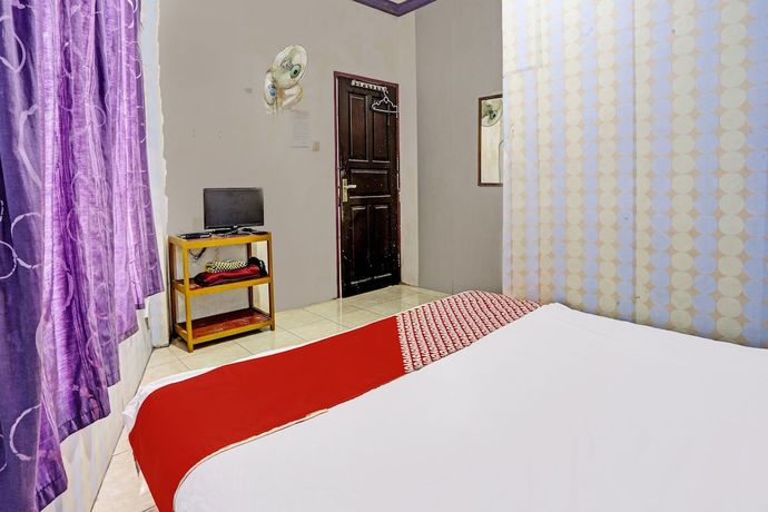 Imagen de la habitación del Hotel SPOT ON 92208 Andira Syariah. Foto 6