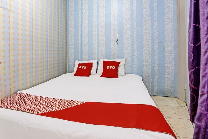 Imagen de la habitación del Hotel SPOT ON 92208 Andira Syariah. Foto 8