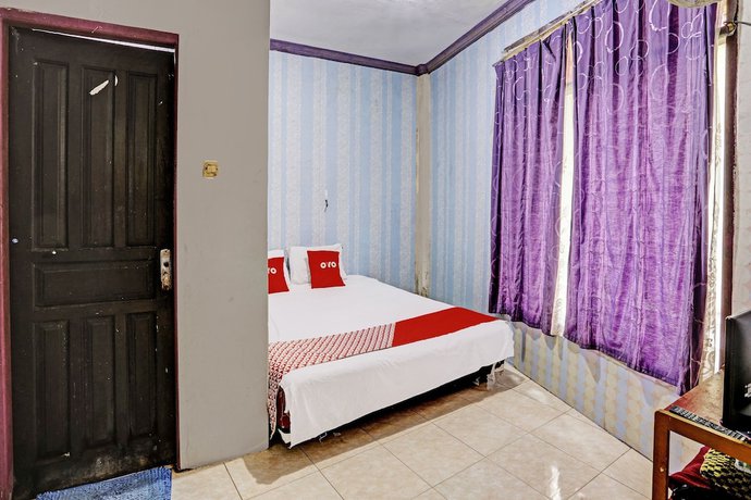 Imagen de la habitación del Hotel SPOT ON 92208 Andira Syariah. Foto 9