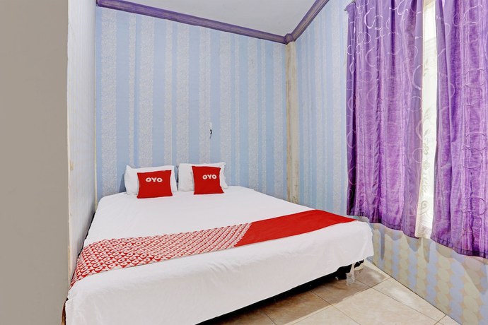 Imagen de la habitación del Hotel SPOT ON 92208 Andira Syariah. Foto 10