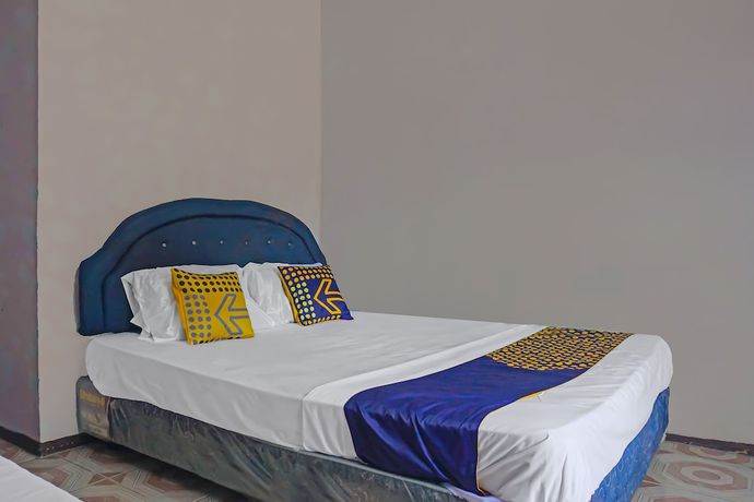 Imagen de la habitación del Hotel SPOT ON 92212 Penginapan Berkah Mandiri Syariah. Foto 9