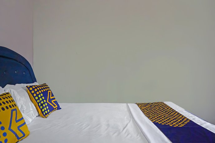 Imagen de la habitación del Hotel SPOT ON 92212 Penginapan Berkah Mandiri Syariah. Foto 14