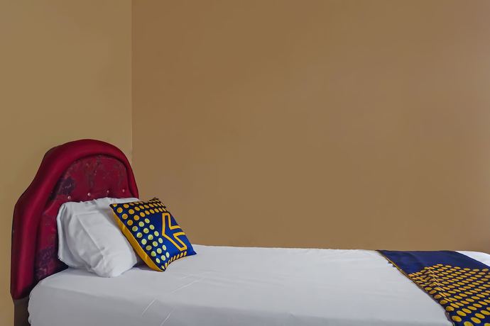 Imagen de la habitación del Hotel SPOT ON 92212 Penginapan Berkah Mandiri Syariah. Foto 16