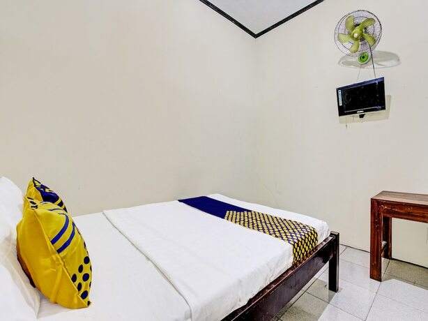 Imagen de la habitación del Hotel SPOT ON 92220 Sari Laut. Foto 20
