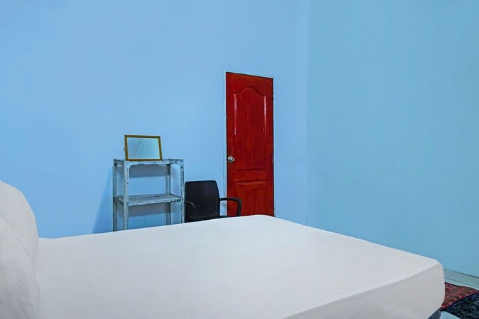 Imagen de la habitación del Hotel SPOT ON 92390 Wilma Kost Syariah. Foto 19