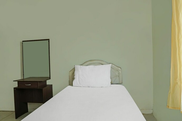 Imagen de la habitación del Hotel SPOT ON 92390 Wilma Kost Syariah. Foto 20