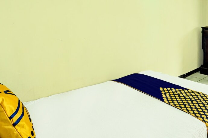 Imagen de la habitación del Hotel SPOT ON 92400 Dhaha Penginapan House Syariah. Foto 15