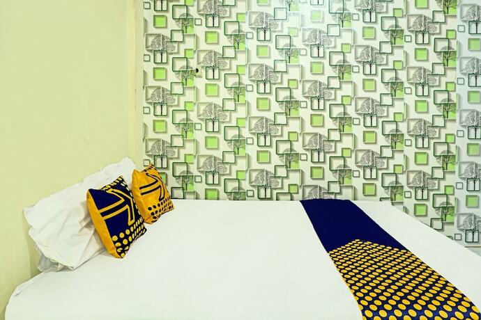 Imagen de la habitación del Hotel SPOT ON 92400 Dhaha Penginapan House Syariah. Foto 16