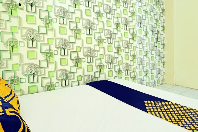 Imagen de la habitación del Hotel SPOT ON 92400 Dhaha Penginapan House Syariah. Foto 20