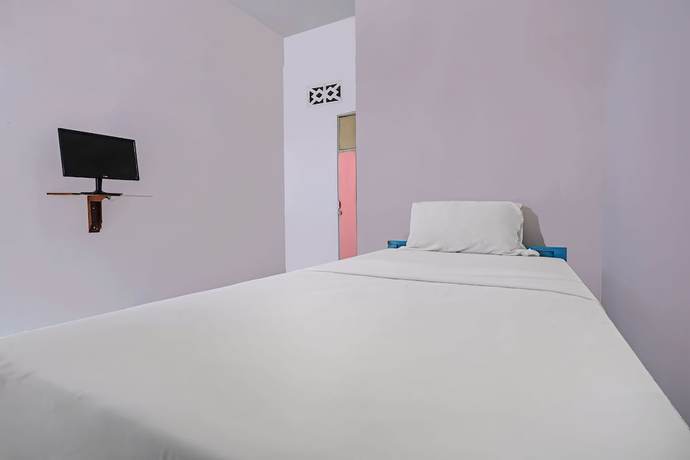 Imagen de la habitación del Hotel SPOT ON 92421 City Kost Syariah. Foto 6