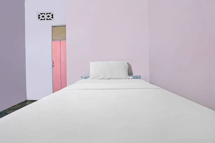 Imagen de la habitación del Hotel SPOT ON 92421 City Kost Syariah. Foto 12