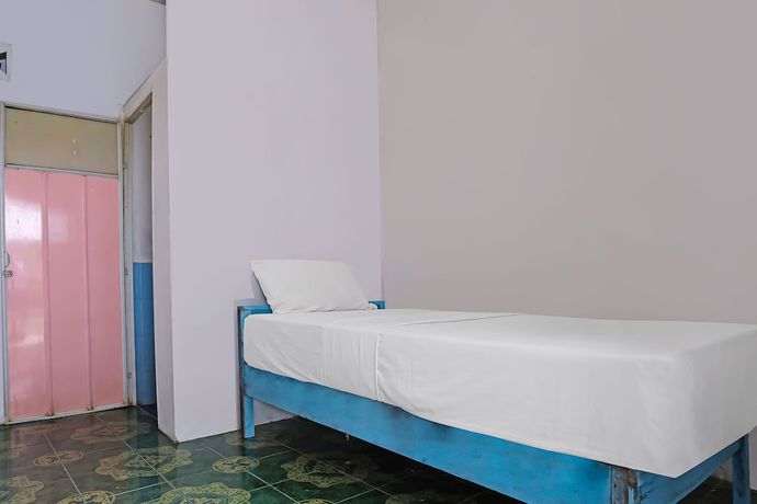 Imagen de la habitación del Hotel SPOT ON 92421 City Kost Syariah. Foto 14