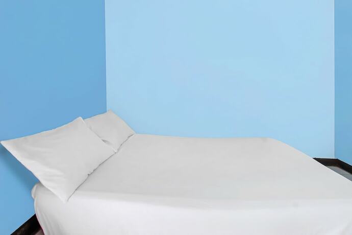 Imagen de la habitación del Hotel SPOT ON 92507 Sukandi Homestay. Foto 19