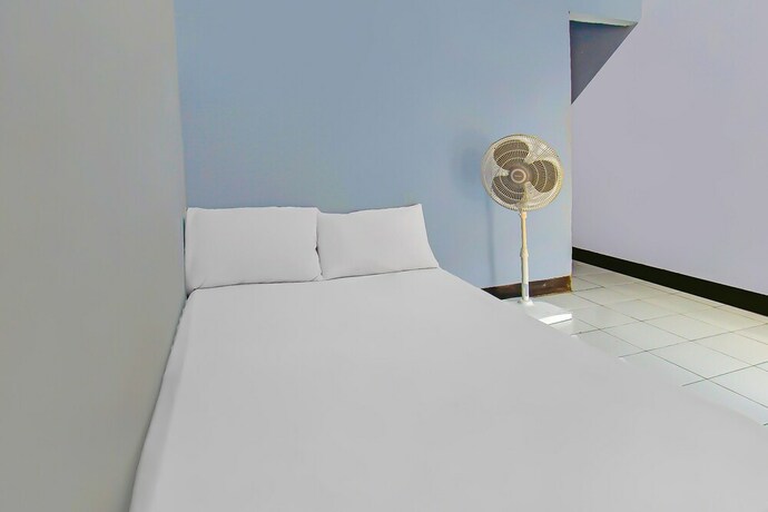 Imagen de la habitación del Hotel SPOT ON 92507 Sukandi Homestay. Foto 20