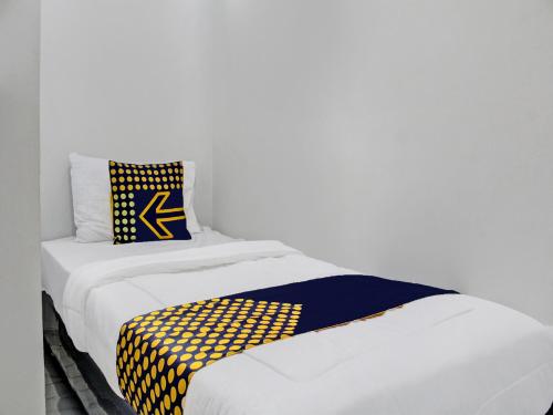 Imagen de la habitación del Hotel SPOT ON 92509 Maulana Guest House Simpur. Foto 20