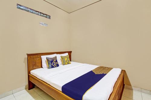 Imagen de la habitación del Hotel SPOT ON 92515 Timoti Guest House. Foto 19