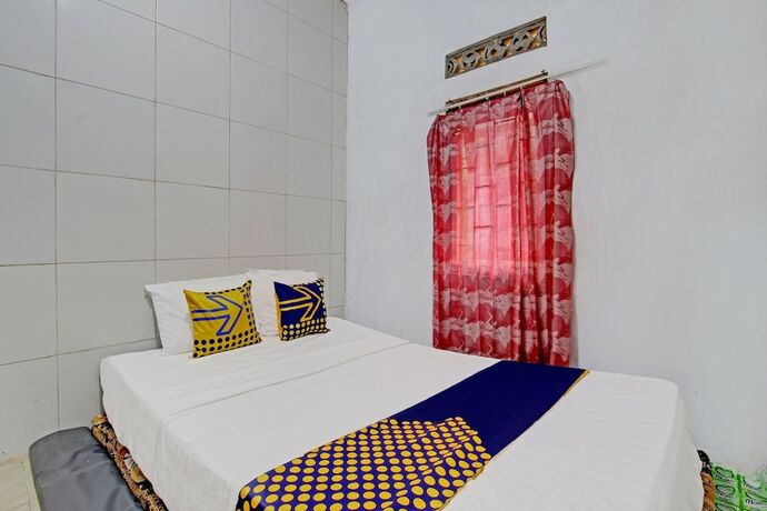 Imagen de la habitación del Hotel SPOT ON 92535 Guest House Pak Darso. Foto 19