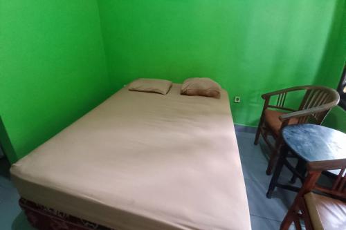 Imagen de la habitación del Hotel SPOT ON 92539 Luqman Kostel Syariah. Foto 19