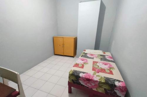 Imagen de la habitación del Hotel SPOT ON 92539 Luqman Kostel Syariah. Foto 20