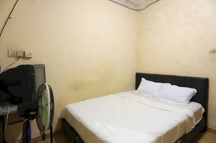 Imagen de la habitación del Hotel SPOT ON 92569 Anto Homestay Syariah. Foto 18
