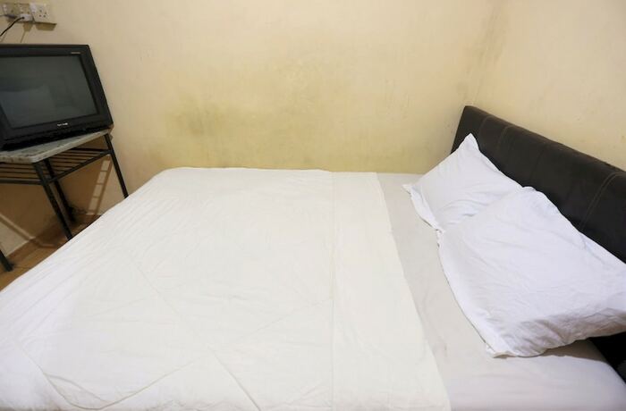 Imagen de la habitación del Hotel SPOT ON 92569 Anto Homestay Syariah. Foto 19