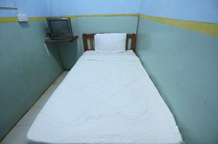 Imagen de la habitación del Hotel SPOT ON 92569 Anto Homestay Syariah. Foto 20