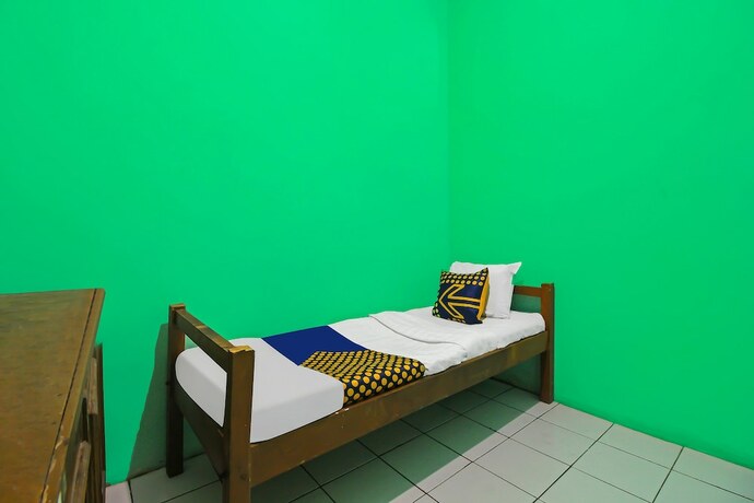 Imagen de la habitación del Hotel SPOT ON 92610 Barokah Kostel Syariah. Foto 17