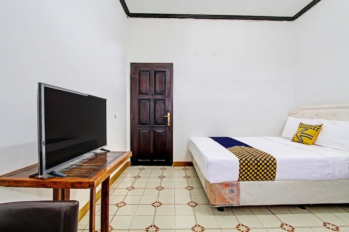 Imagen de la habitación del Hotel SPOT ON 92623 Mw 46 Guesthouse. Foto 17