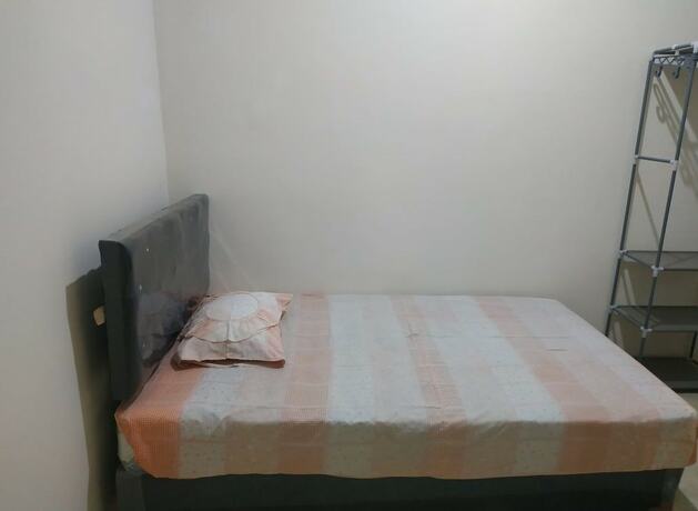 Imagen de la habitación del Hotel SPOT ON 92645 Nita Residence Syariah. Foto 14