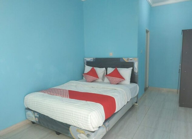 Imagen de la habitación del Hotel SPOT ON 92645 Nita Residence Syariah. Foto 15