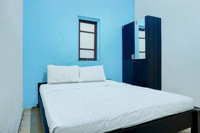 Imagen de la habitación del Hotel SPOT ON 92648 Wisma Padi Syariah Panyipatan. Foto 17