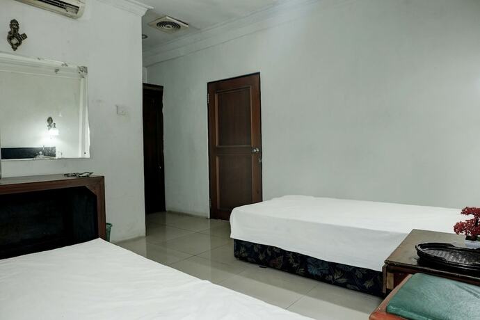 Imagen de la habitación del Hotel SPOT ON 92648 Wisma Padi Syariah Panyipatan. Foto 19