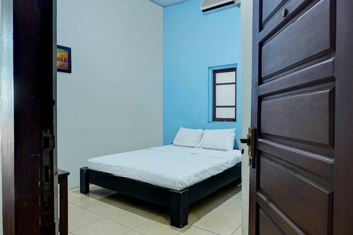 Imagen de la habitación del Hotel SPOT ON 92648 Wisma Padi Syariah Panyipatan. Foto 20