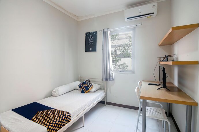 Imagen de la habitación del Hotel SPOT ON 92661 Anartha Residence. Foto 14