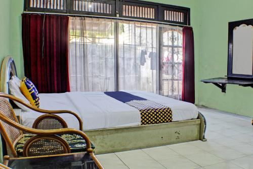 Imagen general del Hotel SPOT ON 92682 Badar Guest House Syariah. Foto 4