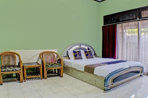 Imagen de la habitación del Hotel SPOT ON 92682 Badar Guest House Syariah. Foto 19